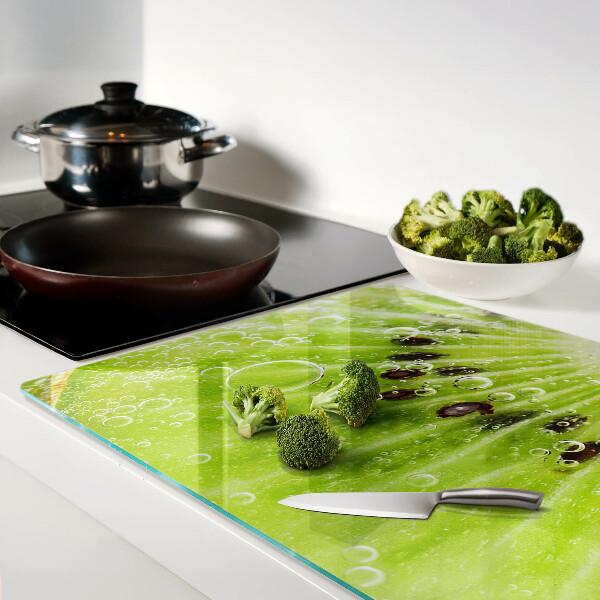 Snijplanken van glas Kiwi met waterdruppels