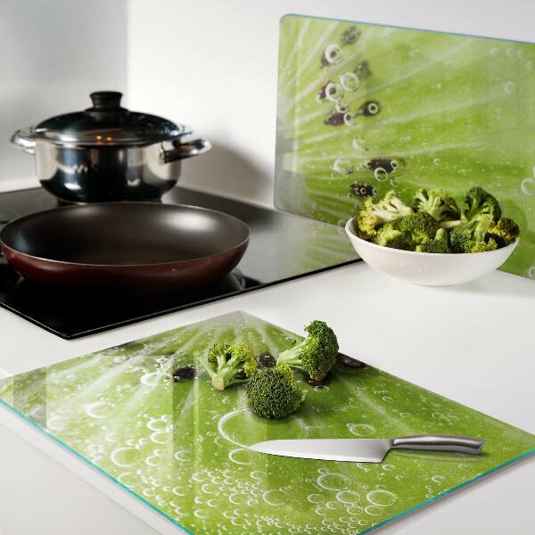 Snijplanken van glas Kiwi met waterdruppels