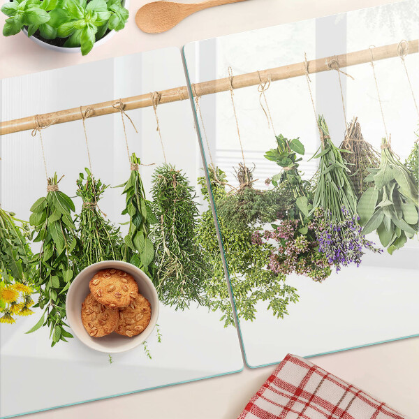 Snijplanken glas Gedroogde kruiden aan een touwtje