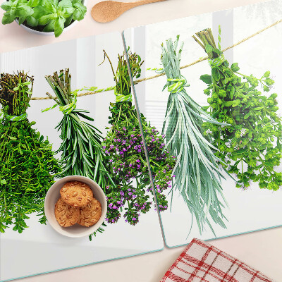 Glazen snijplanken Gedroogde kruiden aan een touwtje