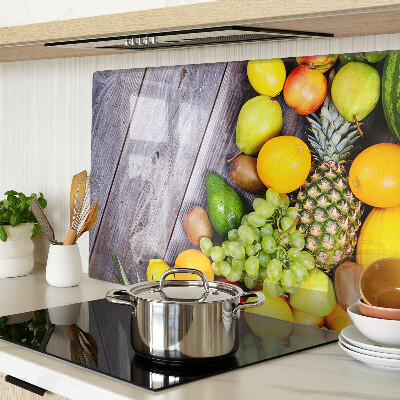 Snijplanken glas Fruit op een houten achtergrond