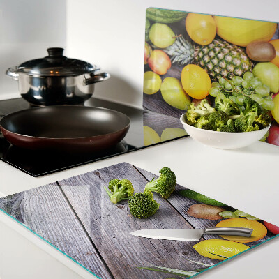 Snijplanken glas Fruit op een houten achtergrond