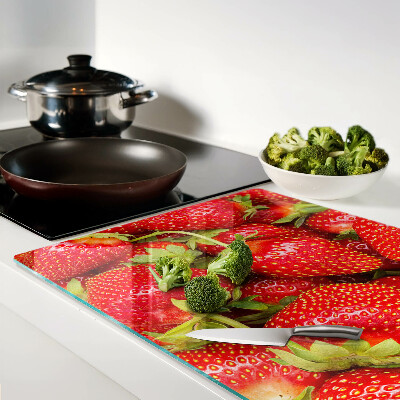 Glazen snijplanken Aardbeien op de achtergrond