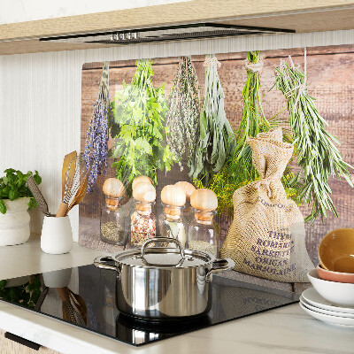 Snijplanken van glas Kruiden en specerijen op een houten achtergrond