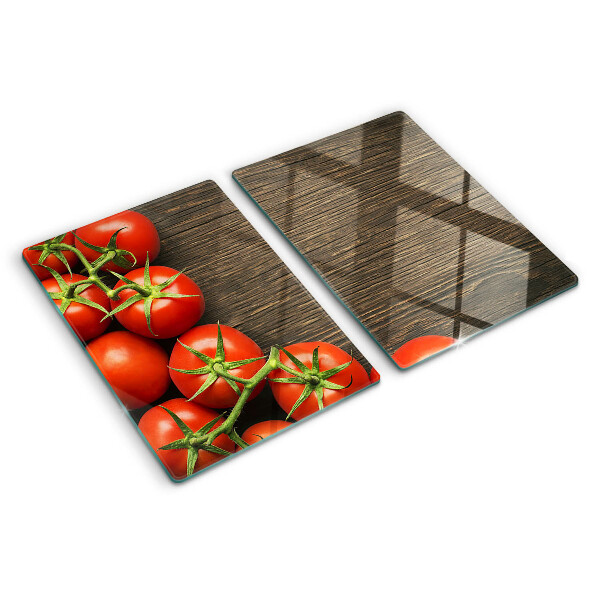 Snijplanken glas Tomaten op een houten achtergrond