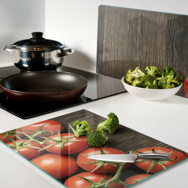 Snijplanken glas Tomaten op een houten achtergrond