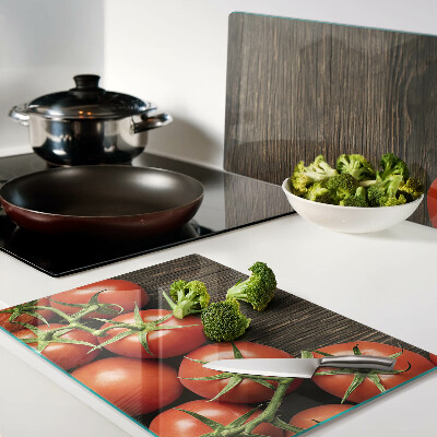 Snijplanken glas Tomaten op een houten achtergrond