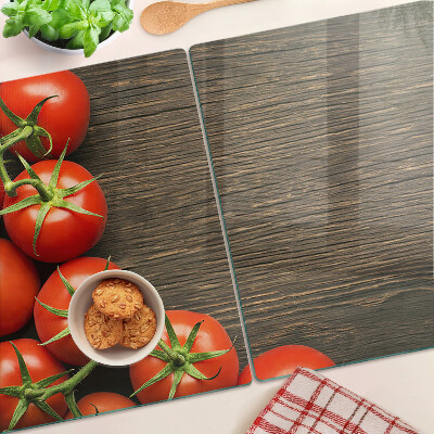 Snijplanken glas Tomaten op een houten achtergrond