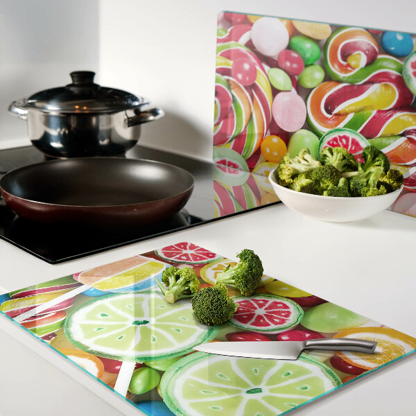 Snijplanken van glas Zoete snoepjes en fruit