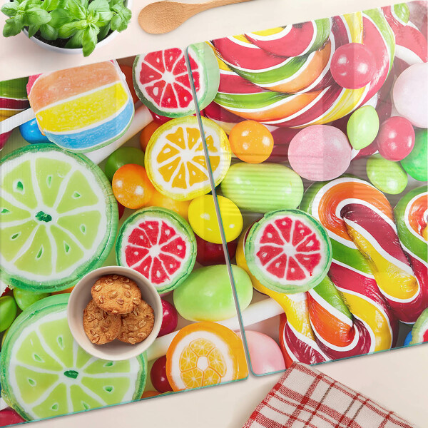 Snijplanken van glas Zoete snoepjes en fruit