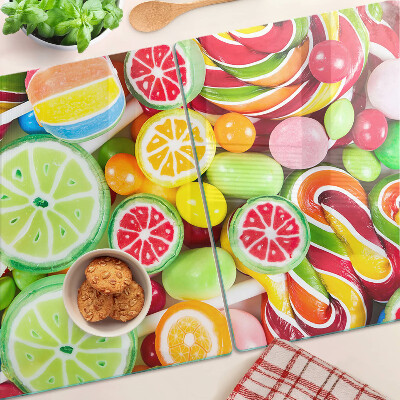 Snijplanken van glas Zoete snoepjes en fruit