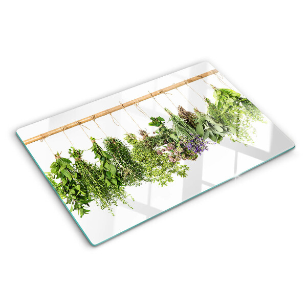 Glazen snijplanken Gedroogde kruiden aan een touwtje