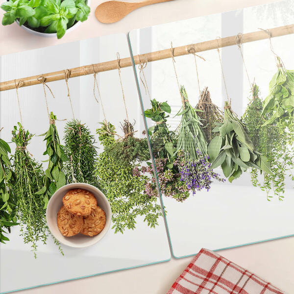 Glazen snijplanken Gedroogde kruiden aan een touwtje