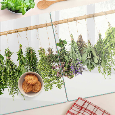 Glazen snijplanken Gedroogde kruiden aan een touwtje