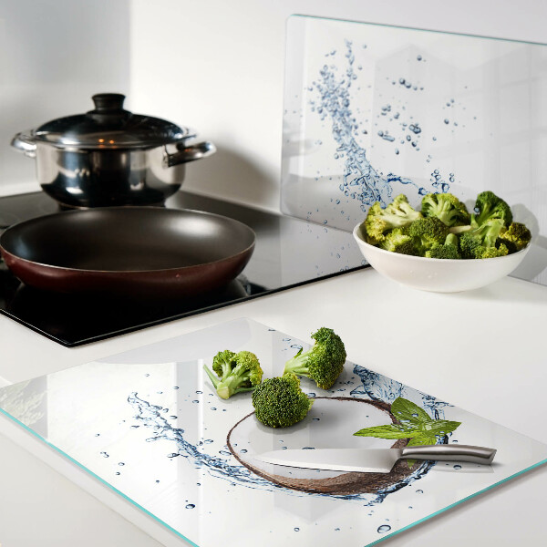 Snijplanken van glas Kokosnoot met water en munt