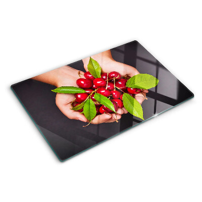 Glazen snijplanken Rode kersen in de hand