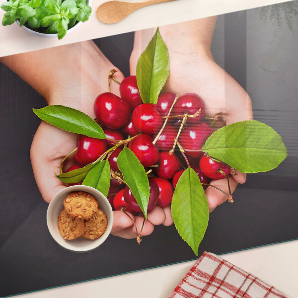Glazen snijplanken Rode kersen in de hand