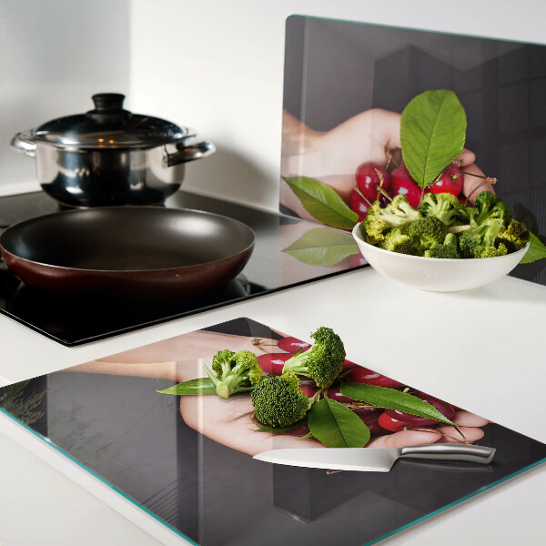 Glazen snijplanken Rode kersen in de hand