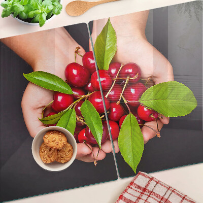 Glazen snijplanken Rode kersen in de hand