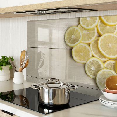 Snijplanken glas Citroenschijfjes op een houten achtergrond