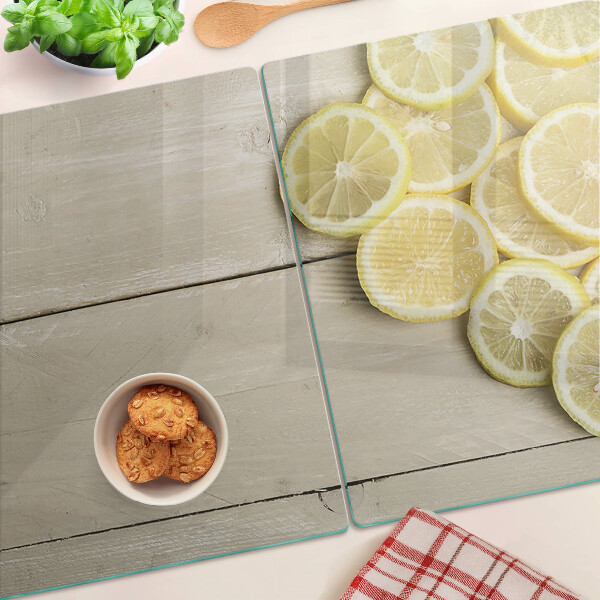 Snijplanken glas Citroenschijfjes op een houten achtergrond