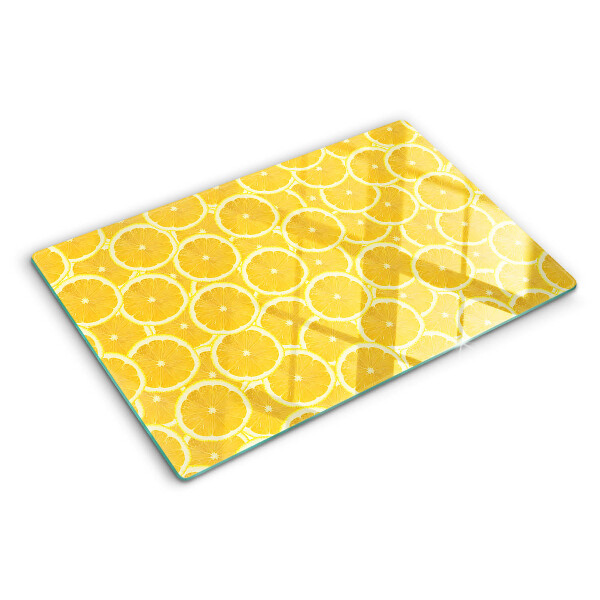 Snijplanken glas Citroenschijfjes op een gele achtergrond