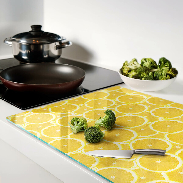 Snijplanken glas Citroenschijfjes op een gele achtergrond