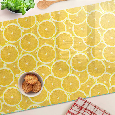 Snijplanken glas Citroenschijfjes op een gele achtergrond