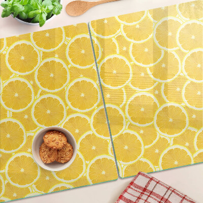 Snijplanken glas Citroenschijfjes op een gele achtergrond