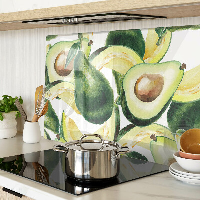 Snijplanken van glas Avocado met bladeren op de achtergrond
