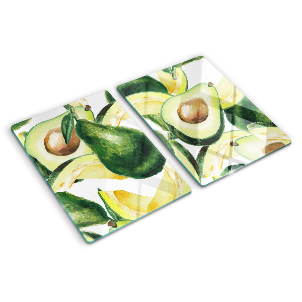 Snijplanken van glas Avocado met bladeren op de achtergrond