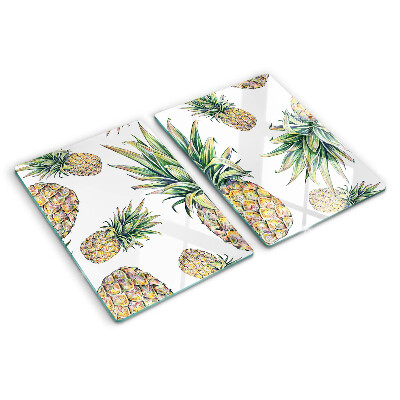 Glazen snijplanken Ananassen op een witte achtergrond