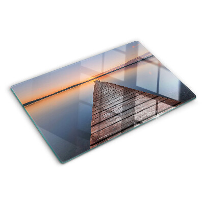 Glazen snijplanken De steiger aan het meer bij zonsondergang