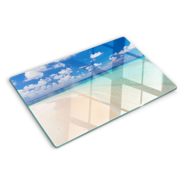 Snijplanken van glas Strand met een blauwe lucht