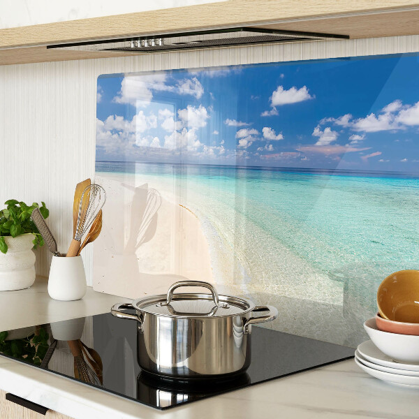 Snijplanken van glas Strand met een blauwe lucht