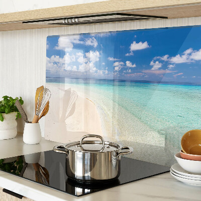 Snijplanken van glas Strand met een blauwe lucht