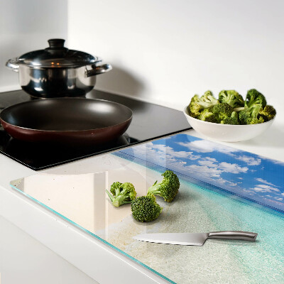 Snijplanken van glas Strand met een blauwe lucht