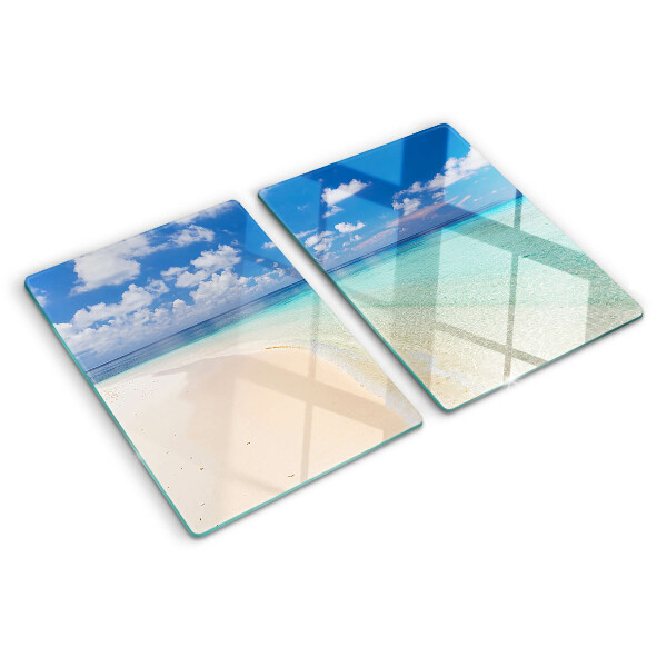 Snijplanken van glas Strand met een blauwe lucht
