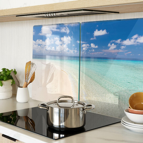 Snijplanken van glas Strand met een blauwe lucht