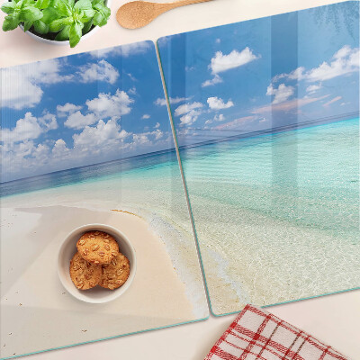 Snijplanken van glas Strand met een blauwe lucht