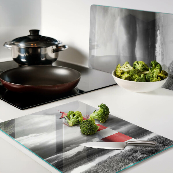 Glazen snijplanken Een vuurtoren in het landschap