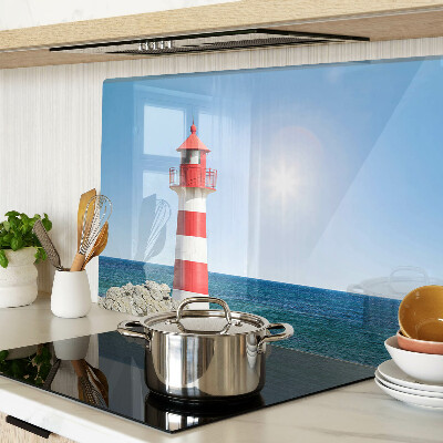 Snijplanken van glas Een vuurtoren boven de oceaan