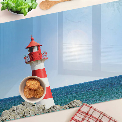 Snijplanken van glas Een vuurtoren boven de oceaan