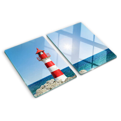 Snijplanken van glas Een vuurtoren boven de oceaan