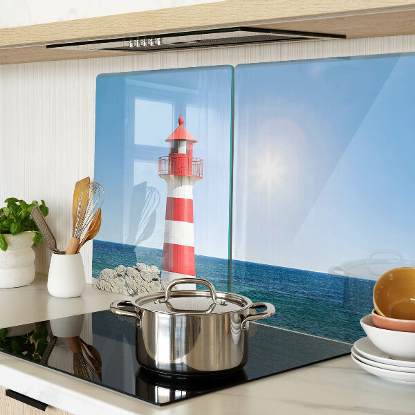 Snijplanken van glas Een vuurtoren boven de oceaan