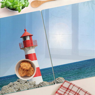 Snijplanken van glas Een vuurtoren boven de oceaan