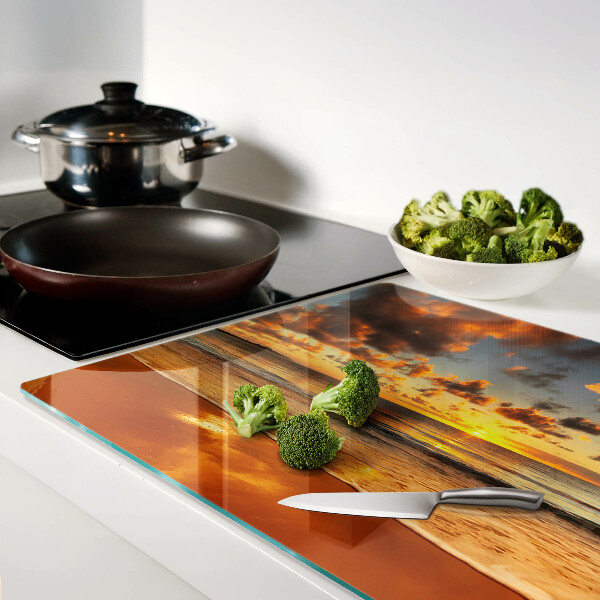 Snijplanken van glas Zonsondergang boven de zee