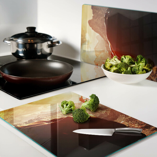 Glazen snijplanken Springen in de bergen bij zonsondergang