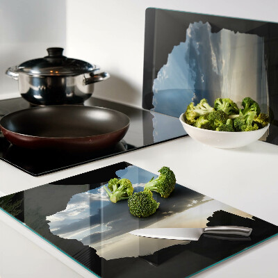 Snijplanken van glas Zonsondergang achter de wolken