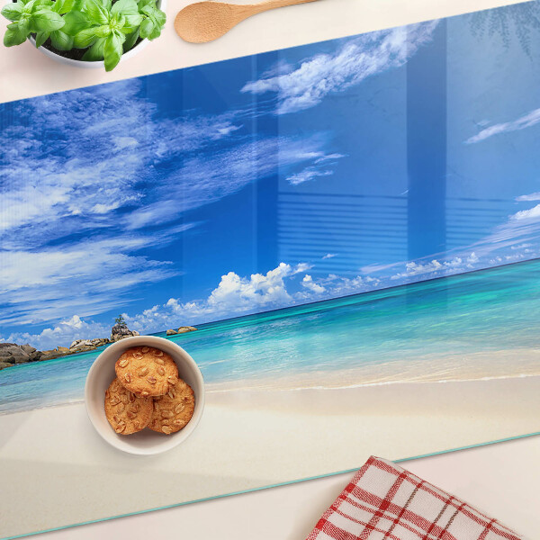 Snijplanken glas Tropisch strand met een blauwe hemel